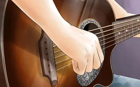 Eine Hand spielt auf einer Gitarre, vielleicht ein Geburtstagslied.