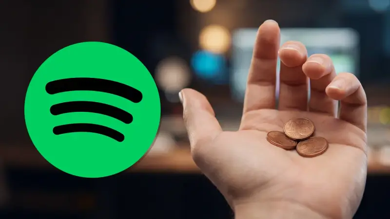 Das Spotify-Logo neben einer Hand mit wenigen Cent Münzen symbolisiert die geringen Einnahmen pro spotify stream.
